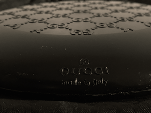 Gucci Frisbee - Tuxedo Park Junk Shop